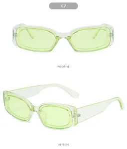 Occhiali da sole rettangolari trasparenti verdi alla moda, protezione UV estiva stile retro.