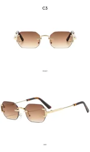 Gafas de sol poligonales sin montura con lentes marrones degradadas y montura dorada