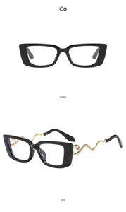Gafas de sol negras de moda con patillas doradas en forma de serpentiine elegantes.