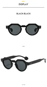 Detailed view of trendy geometric black sunglasses for men and women, UV protection outdoor eyewear.