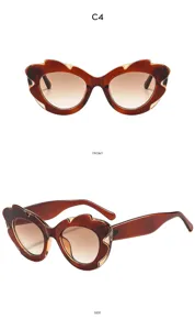 Occhiali da sole irregolari alla moda con lenti sfumate per donne, eleganti per feste.