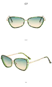 Gafas de sol cat-eye de metal elegante para mujer, lentes degradadas UV400 estilo moderno.