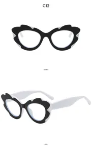 Occhiali da sole alla moda con montatura ondulata irregolare dal design bianco e nero.
