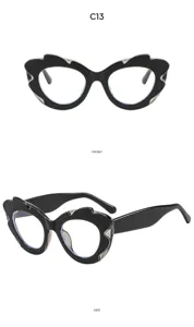 Occhiali da sole cat eye irregolari ed eleganti, moda nera tendenza chic cool now.