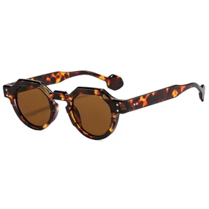 Stylish tortoise shell geometric sunglasses for men and women, trendy UV protection eyewear.