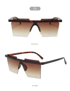 Occhiali da sole oversize con montatura tartarugata e lenti sfumate marroni, modello C5.