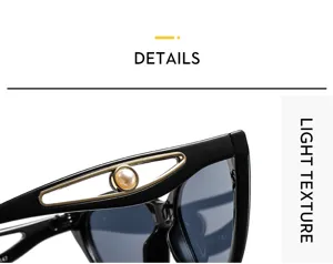 Damen Mode Katzenaugen Sonnenbrille Detailaufnahme mit Perle Bügel und schwarzem Gestell.