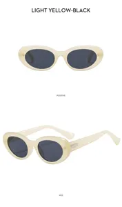 Vintage oval sunglasses for women with trendy light yellow frames and dark lenses, chic design.