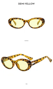 Detailed view of retro oval tortoiseshell sunglasses with light yellow lenses, stylish frame.