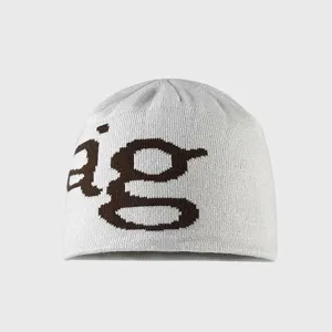 Detailed view of the gray knitted beanie hat with brown letters pattern for winter outdoor skiing.