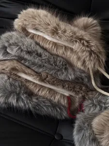 Winter plush trapper hat soft faux fur trim detail, thick warm earflap hat texture.
