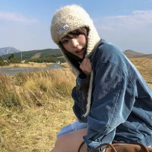Fluffy mohair trapper hat with earflaps, cozy knit winter warm bomber hat for outdoor travel.