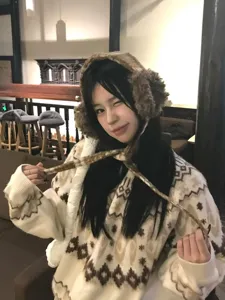 Korean vintage fluffy earmuffs with cute ties and cozy Nordic knit sweater for winter warmth.