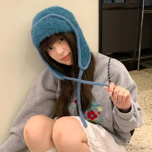Blue fluffy ushanka hat for women, soft winter warm bomber hat with earflaps, cozy fleece.