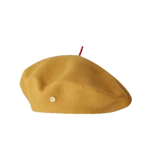 Wool beret detail featuring yellow color, red top stem, and white side button decoration.