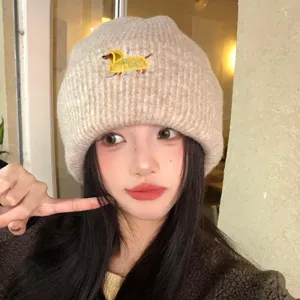 Cute puppy embroidery knitted beanie hat for women, warm winter thermal cap in beige.