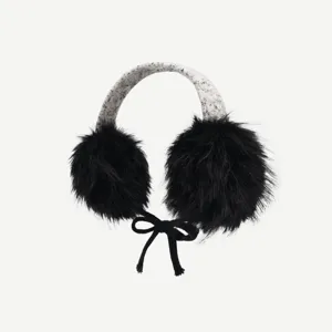 Cute winter plush earmuffs for women, warm fluffy ear warmers, stylish outdoor cold weather gear.
