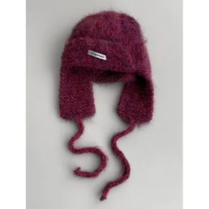 Fluffy mohair trapper hat with earflaps and ties, cozy winter knit hat in rich plum color.