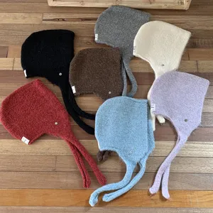 Women winter warm earflap knit beanie hat, thick cozy fleece wool fashion outdoor headwear.