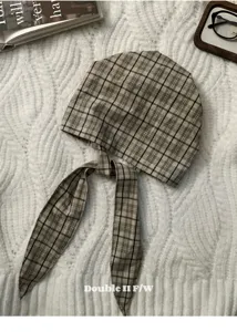 Retro plaid headscarf bonnet hat with ties, stylish fall fashion headwear accessory detail.