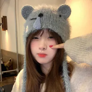 Cute koala knitted beanie hat for women, fuzzy warm winter ear protection cap with funny design.