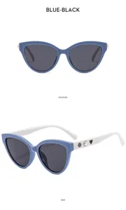 Blue black cat eye sunglasses with pearl and camellia temple charms for women stylish eyewear.