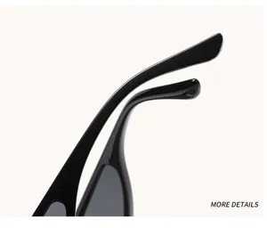 Black sunglasses detail shot showing sleek temple design and dark lenses for stylish looks.