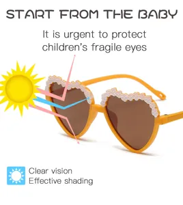 Kids heart-shaped sunglasses with cute floral applique, anti-UV brown lenses for children.