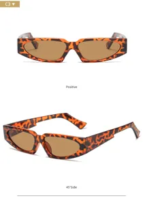 Vista detallada de gafas de sol triangulares estrechas de moda con estampado de leopardo.