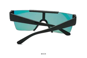 Detail view of oversized square shield sunglasses featuring green mirror lens and thick frame.