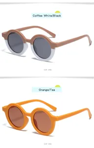 Detail view of colorful round frame children sunglasses, showing color-blocked design.