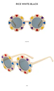 Cute kids sunflower sunglasses with colorful heart appliques, rice white frame and UV protection lenses.