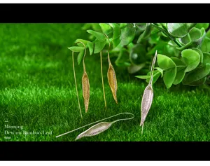Exquisite S925 sterling silver bamboo leaf long hook earrings in gold and silver, nature style.