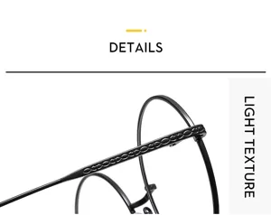 Vista detallada de gafas redondas de metal anti luz azul con elegantes varillas decoradas.