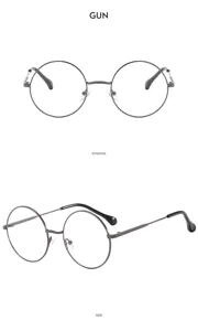 Vista detallada de gafas redondas de metal con montura fina y bisagra resistente para uso.