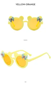 Kids cute bear ear sunglasses with bow, yellow summer beach sun protection eyewear.