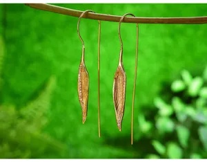 Elegant S925 sterling silver gold-plated leaf long drop earrings with sparkling micro stones.