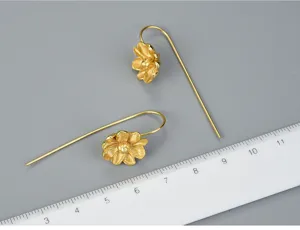 Detail view of the elegant jasmine flower sterling silver drop earrings with a clear size reference.