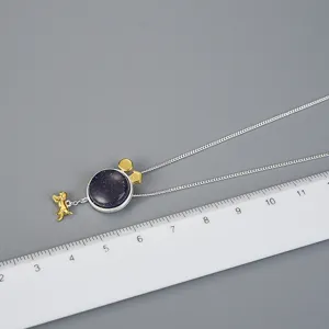Collana con ciondolo in argento sterling 925 e arenaria blu con design creativo.