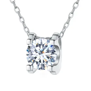 Exquisite round cut moissanite solitaire pendant necklace with four-prong bullhead setting.