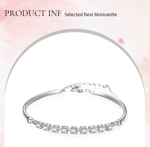 Close-up detail shot of the elegant sparkling moissanite tennis bracelet silver metal.