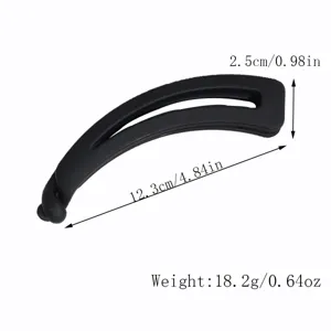 Matte black banana hair clip for women, stylish ponytail holder and styling accessory.