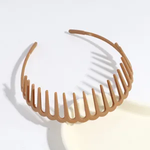 Brown plastic hair comb headband with teeth design detail, perfect for daily wear and non-slip styling.