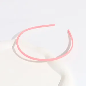 Pink frosted plastic headband with teeth detail, thin design, elegant and anti-slip hair accessory.