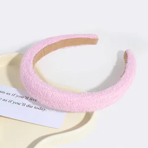 Pink wide bouclé padded headband detail, sweet style hair accessory for women and girls.