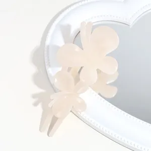 Translucent frosted butterfly hair claw clip elegant minimalist styling accessory for daily wear