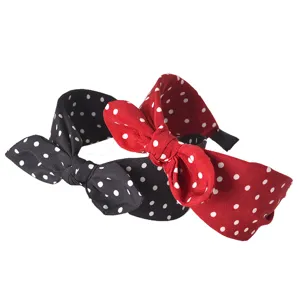 Cerchietto in tessuto a pois annodato, grazioso cerchietto per capelli con orecchie di coniglio.