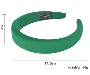 Green padded headband for women, solid color wide fabric hair hoop for daily fashion wear.
