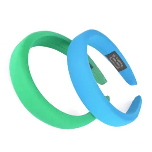 Detailed view of the padded fabric headband set, featuring soft solid colors for styling.