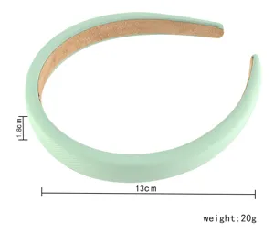 Mint green padded headband detail, soft fabric wrapped wide hair hoop for daily wear.